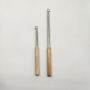 Stainless steel telescopic pole with wooden handle